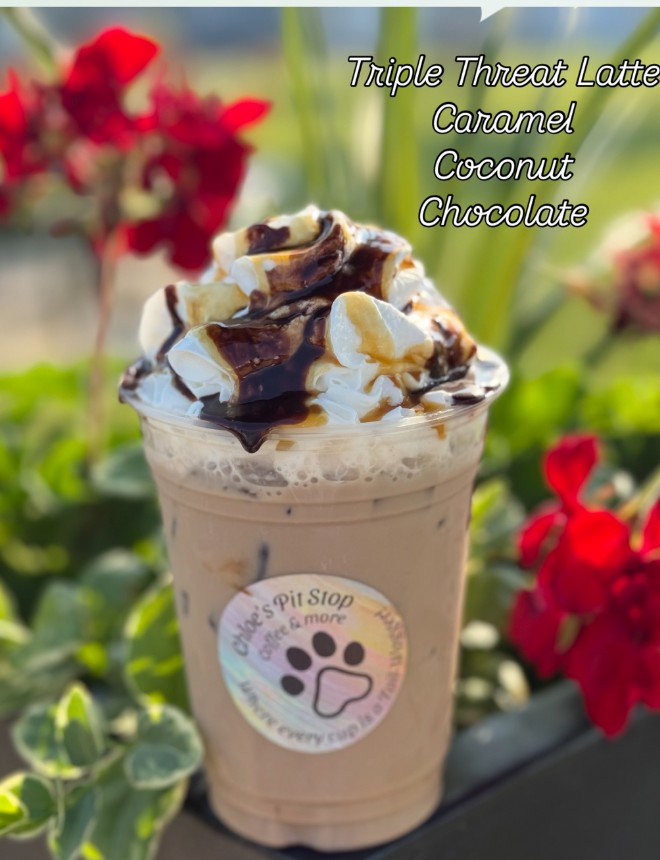 The Triple Threat, one of the signature lattes at Chloe's Pit Stop, topped with whipped cream and drizzle
